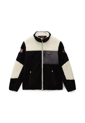 Giacca in pile bianco e nero con zip frontale completa, tasche sul petto e laterali con zip e toppe su entrambe le maniche superiori.
