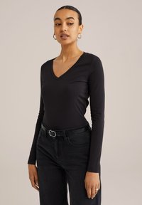 Långärmad tröja - black