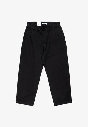 Black cotton trousers with a loose fit, featuring an elastic waistband, two side pockets, and cuffed hems. Smooth texture, casual design.