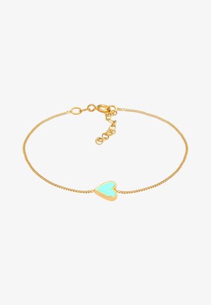 Bracelet en chaîne dorée avec un accent en turquoise en forme de cœur. La chaîne est tordue et comprend un fermoir en lobster avec une chaîne d'extension.
