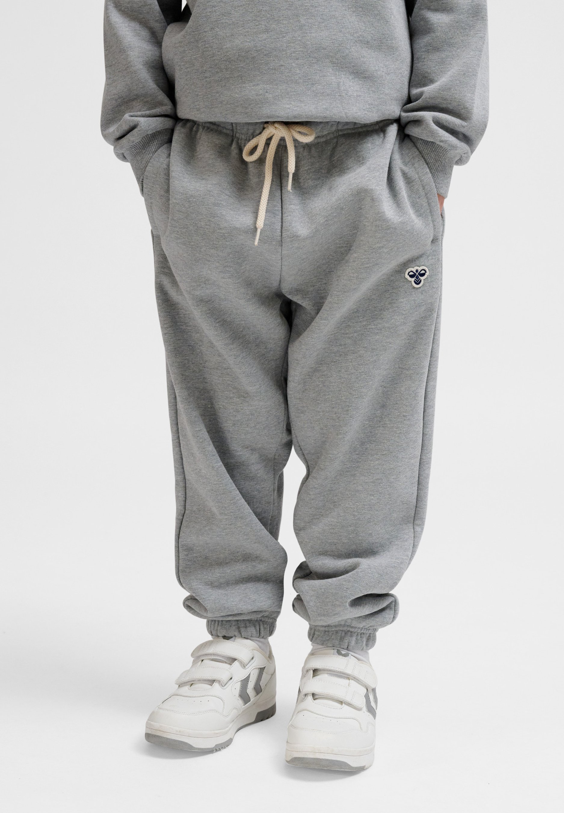 Hummel JR BEE Tracksuit bottoms grey melange/grey Zalando