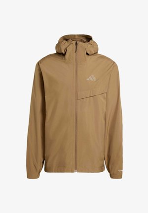 Ruskea kevyt takki hupulla, vetoketjulla edessä ja rintataskulla. Ominaisuuksiin kuuluu hillitty brändäys ja sileä pinta.