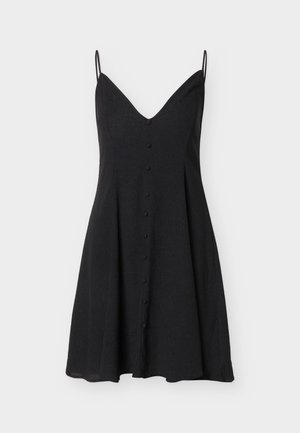 Μαύρο αμάνικο φόρεμα με λεπτές τιράντες, V-λαιμόκοψη και σειρά κουμπιών καλυμμένα με ύφασμα μπροστά, φαρδιά φούστα.