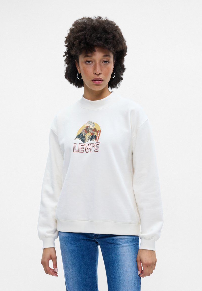Sudadera blanca, diseño de cuello redondo, gráfico bordado con "LEVI'S". Material suave, puños y dobladillo acanalados, presenta mangas voluminosas.