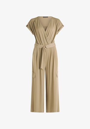 Khaki jumpsuit with short sleeves, V-neck, waist tie, wide legs, and two side pockets. Made from a soft, flowy fabric.