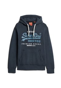 Navyblauwe katoenen hoodie met witte koordjes, een voorste kangaroo zak en een grote logo afbeelding in vintage-stijl in blauw en wit.