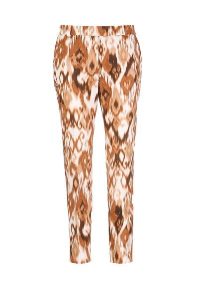 Pantalon imprimé avec un motif abstrait marron et blanc, une ceinture élastique, des jambes fuselées et une texture de tissu lisse.