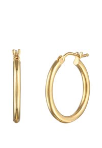 Guld hoop øreringe med en glat, poleret overflade. De har en hængselåbning og en cirkulær form, der måler cirka 3 cm i diameter.