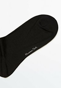 Black sock made of smooth, stretchy material featuring a rounded toe and a white "Massimo Dutti" logo on the side.