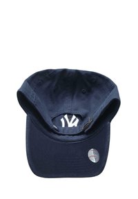 Navy blue baseball cap with a white embroidered logo on the front, curved brim, fabric texture, and circular tag depicting a baseball.