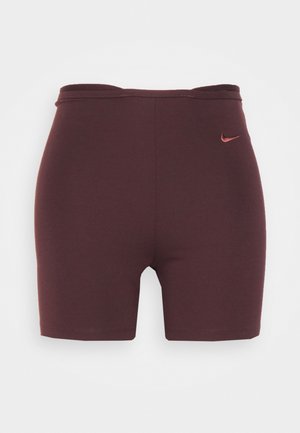 Burgundy athletic shorts with a high waist, made of stretchy fabric, featuring a small Nike logo in a contrasting shade on the left side.