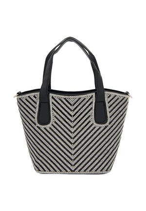 Sort/hvid stribet tote bag pyntet med rhinsten, med to solide sorte håndtag og en struktureret form.