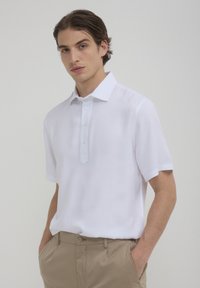 Calliope TINTA UNITA  - Polo - bianco