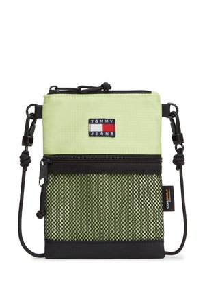 Μικρή τσάντα χιαστί σε ανοιχτό πράσινο και μαύρο χρώμα με μπροστινή τσέπη με φερμουάρ από δίχτυ, ρυθμιζόμενο λουρί κορδόνι και ετικέτα με το λογότυπο Tommy Jeans.