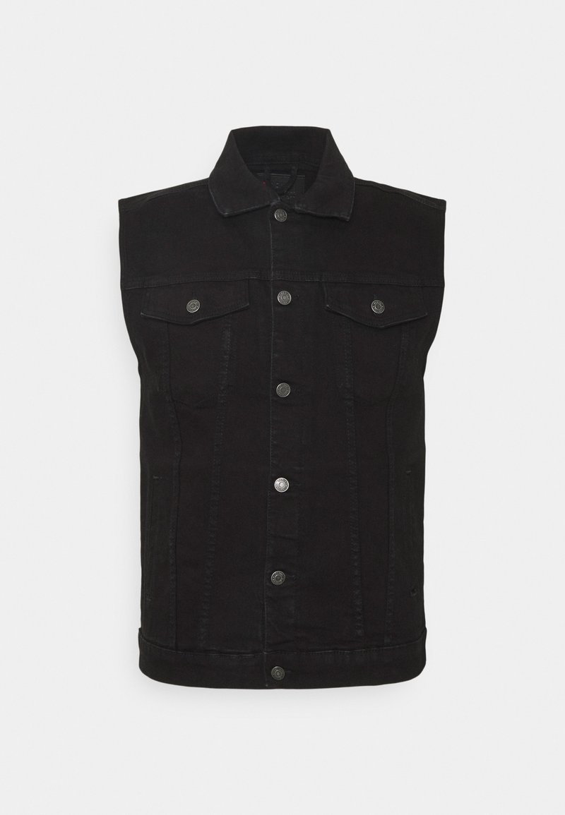 Veste en jean noire sans manches avec fermeture à boutons sur le devant et deux poches poitrines à boutons, présentée sur un fond clair.