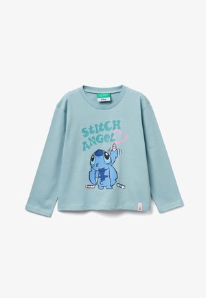 Hellblaues Langarmshirt mit einem Comic-Charakter und dem Text "STITCH ANGEL" sowie bunten Markierungen, aus weichem Baumwollmaterial gefertigt.
