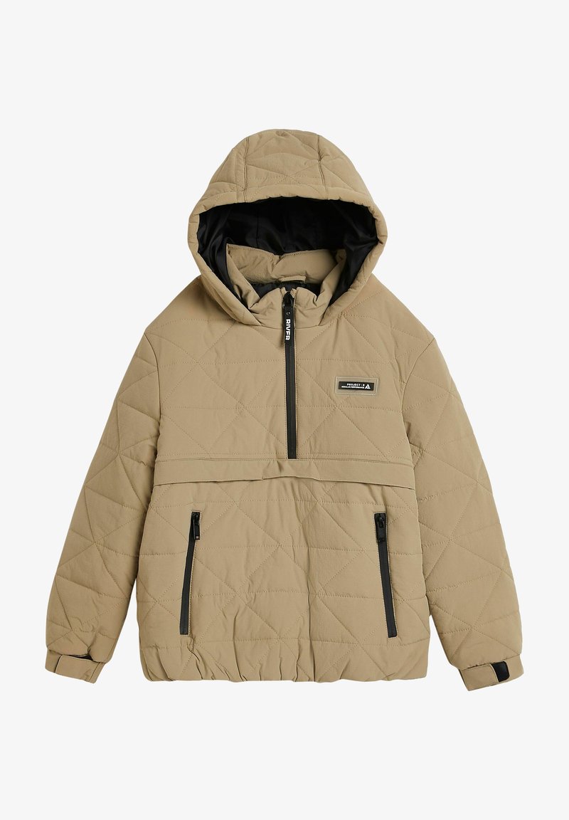 Veste matelassée beige avec capuche, dotée d'un zip central demi-long, de deux poches latérales zippées noires et de poignets élastiques. Doublée en noir.