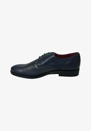Black leather men's dress shoe with laces, low heel, and smooth polished finish, shown from the side on a white background.