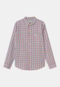 Koszula zapinana na guziki z wielokolorowym wzorem w kratę w odcieniach czerwieni, niebieskiego i zieleni. Długie rękawy, pojedyncza kieszeń na piersi, zaokrąglony dół.