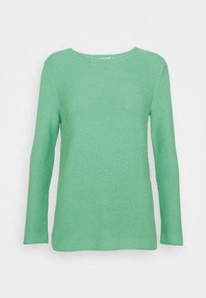 Top verde a maniche lunghe con costine e scollo arrotondato. Texture liscia, vestibilità slim e orlo dritto. Senza grafiche o decorazioni visibili.