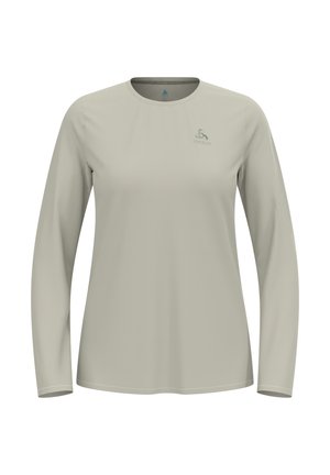 Light beige long-sleeve crew neck shirt with a small logo on the upper left chest, displayed on a plain white background.