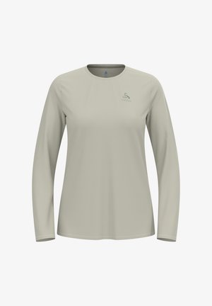 Light beige long-sleeve crew neck shirt with a small logo on the upper left chest, displayed on a plain white background.