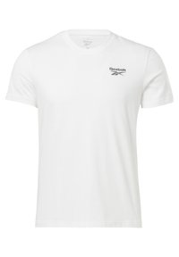 Bílé tričko s krátkým rukávem značky Reebok s klasickým kulatým výstřihem a malým černým logem Reebok na levé horní části hrudi.