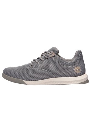 Gray mesh sneaker with lace-up front, white midsole, and subtle tree logo on the heel, shown in side profile on a white background.