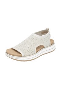 Sandale léger beige à enfiler avec un dessus en maille texturée, des côtés ouverts et une semelle intérieure rembourrée. Présente une semelle en caoutchouc contrastée avec des accents blancs.