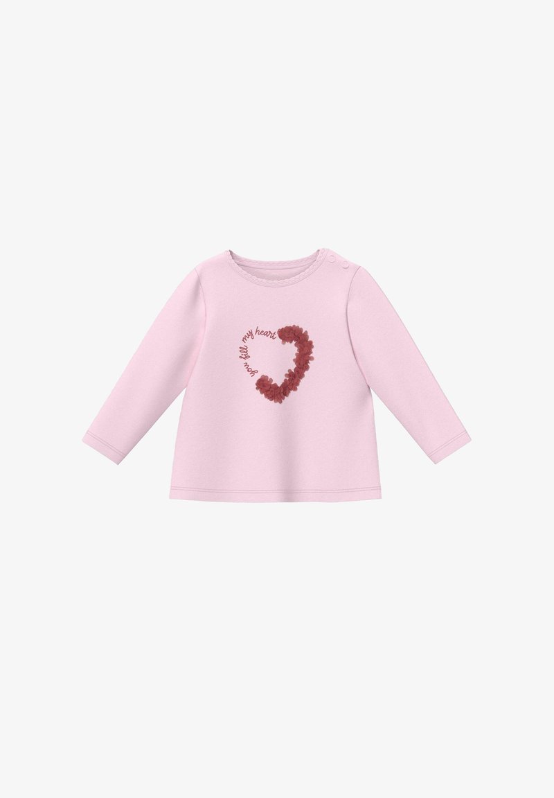 Chemise bébé à manches longues rose clair avec boutons pression sur l'épaule, motif cœur floral et texte "tu remplis mon cœur" en rouge.