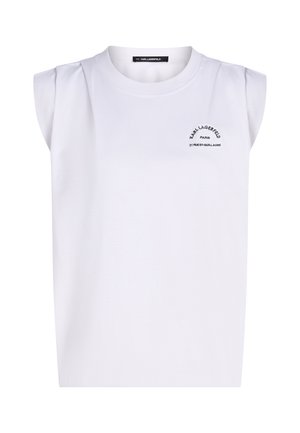 Witte mouwloze top met gewatteerde schouders en zwarte tekst "Karl Lagerfeld Paris 21 Rue St-Guillaume" op de linkerborst.
