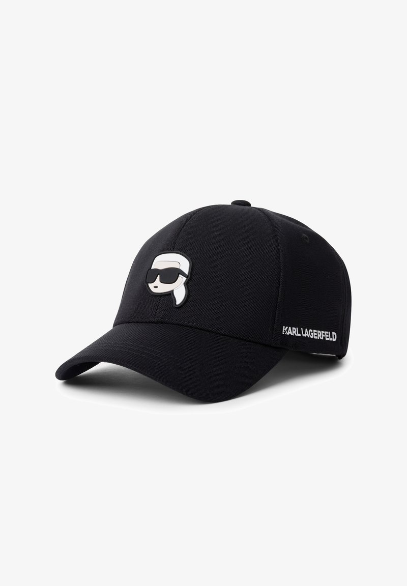 Cappellino da baseball nero con patch logo di Karl Lagerfeld che raffigura un volto stilizzato con capelli bianchi e occhiali da sole neri sul pannello frontale.