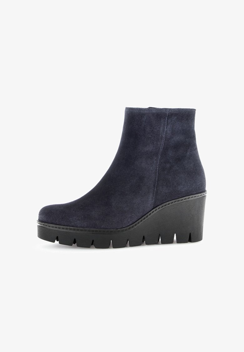 Wedge ankle boots in navy suede, featuring a sleek design, textured upper, and a ridged black platform sole for added height.