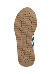 Adidas potplat tenisice, gumeni s teksturiranom površinom, s kružnim utorima i bež bojom. Logotip marke je utisnut.