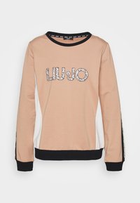 Světle hnědá mikina s černými akcenty, s logem "LIUJO" v texturovaném vzoru. Dlouhé rukávy a kulatý výstřih.