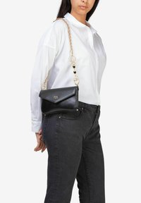 Miriade Clutch - nero