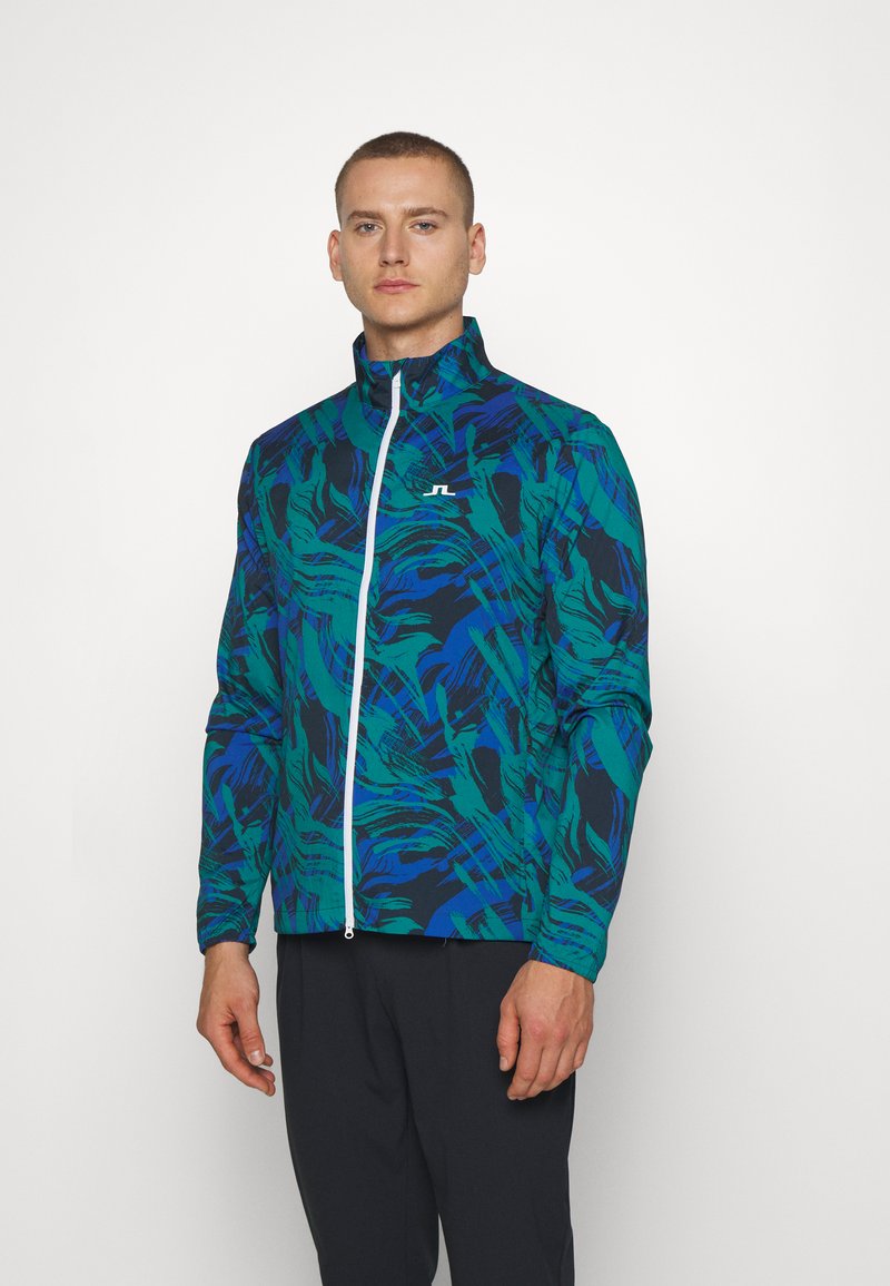 J.LINDEBERG Sports ASH LIGHT PACKABLE Hardshell jacket death valley/multicolour/dark blue