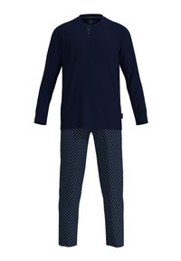 Marineblaues Langarmshirt mit Knopfleiste und gemusterten Schlafanzughosen mit kleinen weißen Kreisen auf marineblauem Hintergrund.