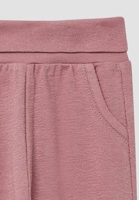 Roze textuur sweatpants met een brede elastische tailleband en zijzakken, gekenmerkt door een zachte, geweven stofafwerking.