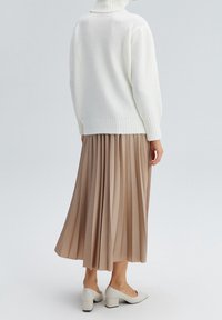 Touché Privé Sweter