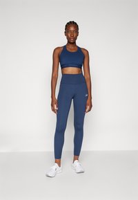 New Balance HARMONY HIGH RISE LEGGING - Punčochy - navy
