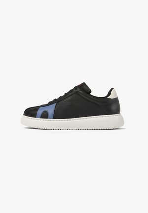 Black leather sneaker with blue leather accent and white rubber sole. Features a rounded toe and lace-up design. Brand logo embossed on side.