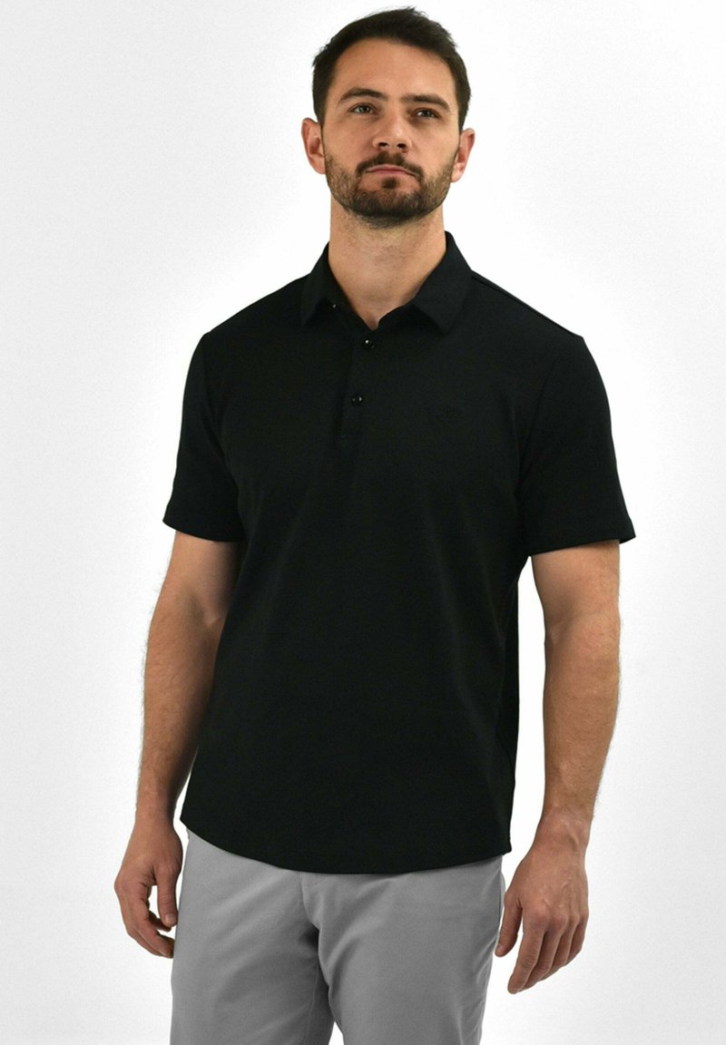 Black polo shirt with short sleeves, three-button placket, and a subtle logo on the chest, made from a smooth fabric.