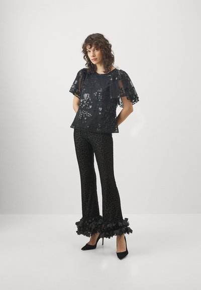 Ida Sjöstedt FOXY TROUSERS - Trousers - black leo