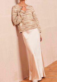 Next Sweter