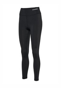 Leggings de sport noirs avec une taille haute, texture lisse et coutures renforcées. Présente un petit logo à la taille.