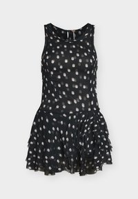 Μαύρο φόρεμα χωρίς μανίκια με λευκές πουά, εφαρμοστή πάνω μέρος, στρωματοποιημένη φούστα με βολάν και στρογγυλή λαιμόκοψη με κλείσιμο με κουμπιά στην πλάτη.