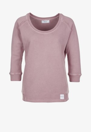 Felpa rosa a maniche lunghe realizzata in morbido cotone. Presenta un collo ampio, polsini a coste e una piccola etichetta con logo sull'orlo. Design semplice.