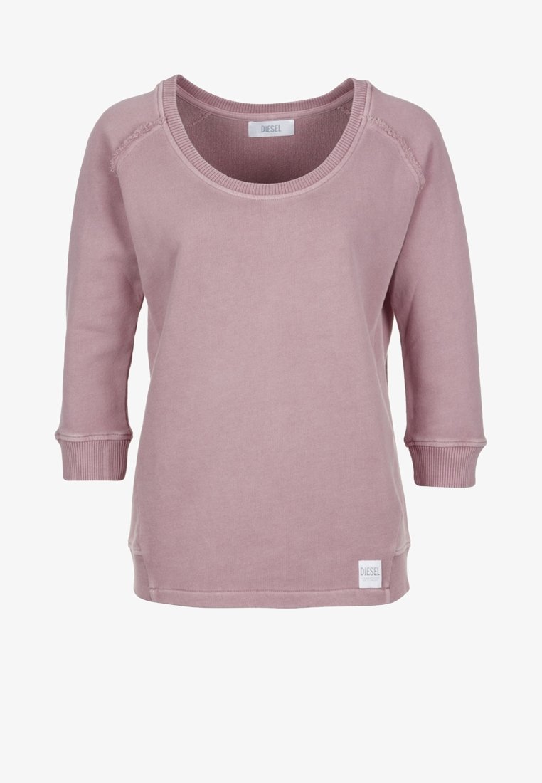 Felpa rosa a maniche lunghe realizzata in morbido cotone. Presenta un collo ampio, polsini a coste e una piccola etichetta con logo sull'orlo. Design semplice.