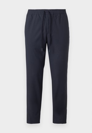 Navy lounge pants with an elastic waistband and adjustable drawstring. Made from lightweight fabric with a smooth texture. Cropped design.